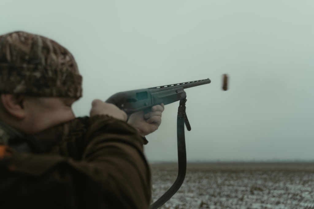 Man trying to shoot a prey